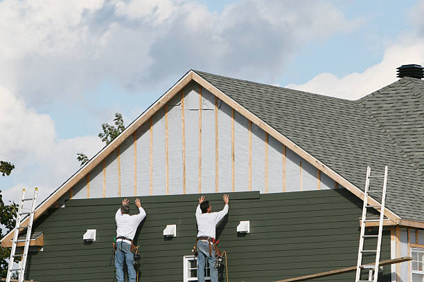 Professional Siding Installation technician working in Orange City, FL